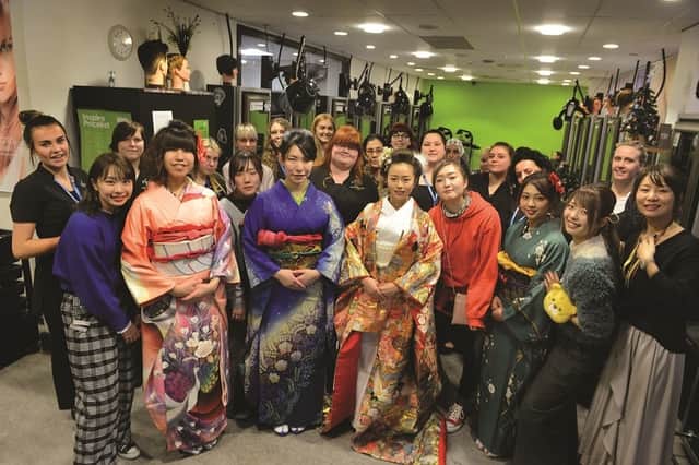 Students from the Toyo College of Hair Design near Tokyo, demonstated the art of the kimono for their counterparts at Rotherham College recently. 172041-8