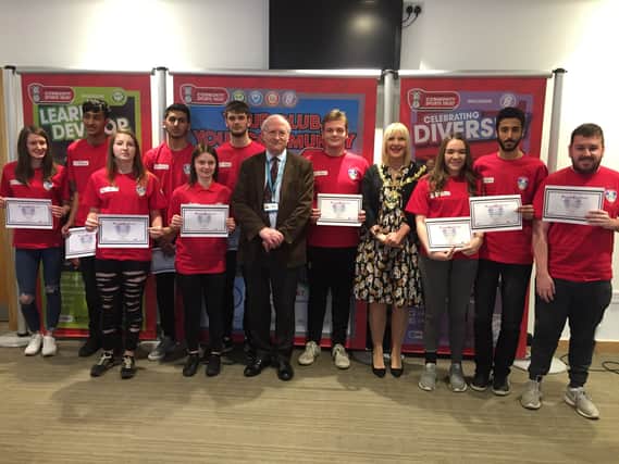 Police commissioner Dr Alan Billings and the Mayor of Rotherham, Eve Rose Keenan, with Rotherham United Community Sports Trust