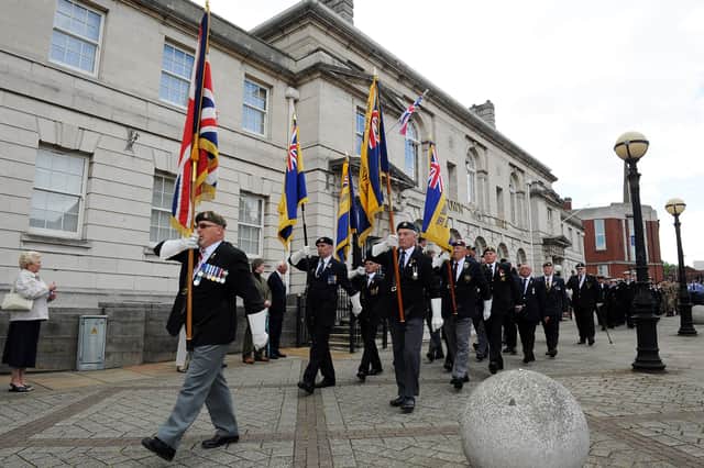 Armed Forces groups parade past Rotherham Town Hall during last year's parade