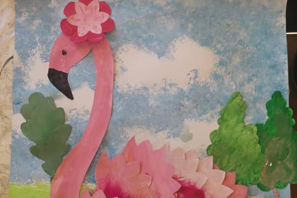A flamingo standing in the Dubai Miracle garden created by residents in Stavely