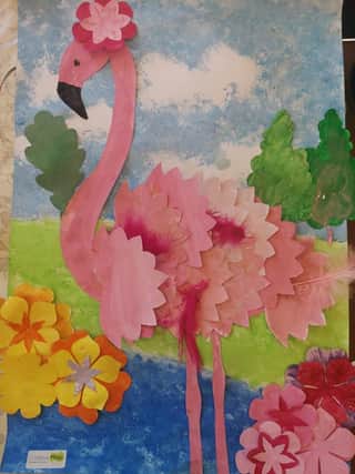 A flamingo standing in the Dubai Miracle garden created by residents in Stavely