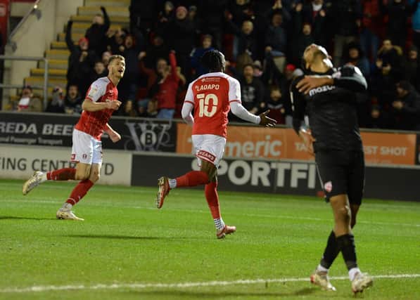 Freddie Ladapo scores against Morecambe. Picture by Kerrie Beddows