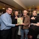 (left to right) Shift manager Shaun Brown; pub manager Adam Gill; Rotherham CAMRA Branch pubs campaigns coordinator and vice-chairman, Paul Redfern; shift manager Rebecca Pilgrim; and Rotherham CAMRA Branch chairman Steve Burns,