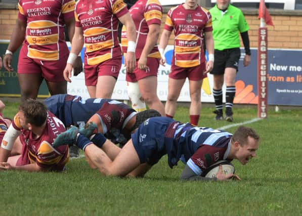 Connor Dever goes over for Rotherham's early try against Sedgley Park. Picture by KERRIE BEDDOWS