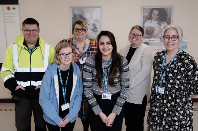 Left to right: Lewis Willis, gardener; Vicky Longley, supported intern; Emily Wraw, head of EDI; Munazza Shah, EDI advisor; Robyn Layton from Landmarks College; Laura Allwood, service manager