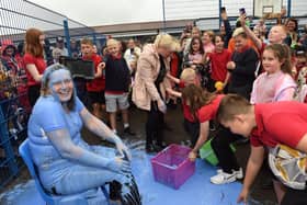 Feeling a little blue-Headteacher at Maltby Manor Academy, Joanne Cliff, who was given the unusual leaving present of being gunged by pupils during the summer fair.