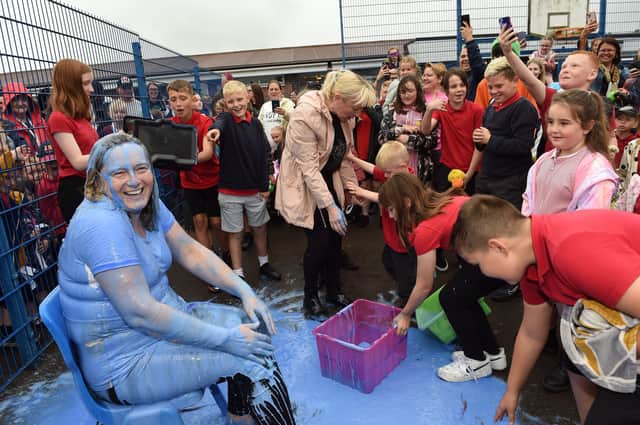 Feeling a little blue-Headteacher at Maltby Manor Academy, Joanne Cliff, who was given the unusual leaving present of being gunged by pupils during the summer fair.