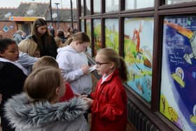 MP Ed Miliband officially unveiled new murals on the windows of Mexborough Library, which were created by author and artist Phil Sheppard with children from local schools.