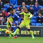 Joel Ekstrand gets to grips with a tough debut against Cardiff.