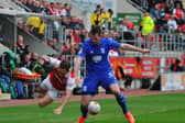 Jon Taylor is upended by Birmingham City's Jonathan Grounds in Friday's draw.