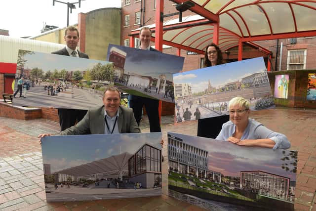 Showing the artists impressions of the masterplan for Forge Island are (from left to right): urban design director for White Young Green Andrew Clarke, strategic director of regeneration and environment for Rotherham Borough Council Damien Wilson, leader of Rotherham Borough Council Chris Read, chief executive Sharon Kemp and cabinet member for jobs and the local economy Denise Lelliott. 170932