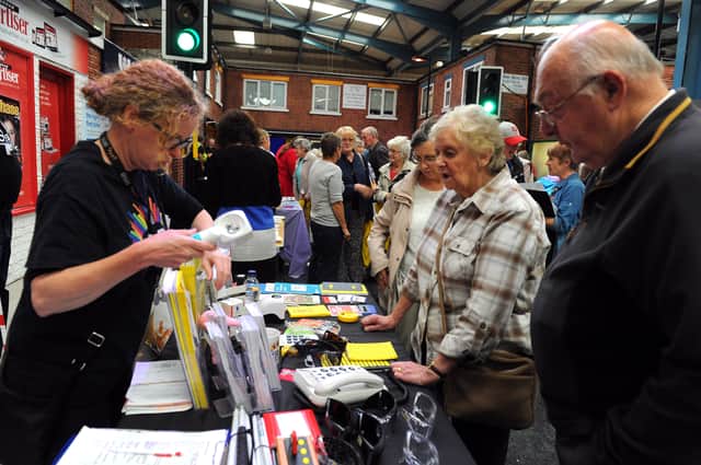 Older people receiving advice at a previous Lifewise Centre event for the over-60s.