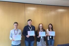 Pictured (From left to right): Jack Rhodes, Jack Bell, Alicia Dimberline and Natalia Golawska receive their work experience certificates.