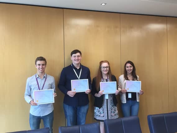 Pictured (From left to right): Jack Rhodes, Jack Bell, Alicia Dimberline and Natalia Golawska receive their work experience certificates.