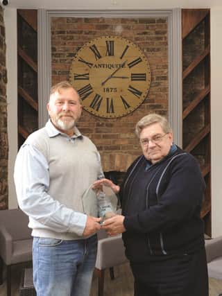 Owner of the George Wright boutique hotel, Mark McGrail, is seen being presented with the Stan Crowther Award from, Brian King, chairman of the Rotherham and District Civic Society