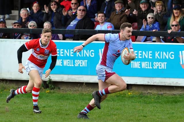Dan Leake goes over for the first of his two tries at Clifton Lane on Saturday. Pictures by STEVE METTAM