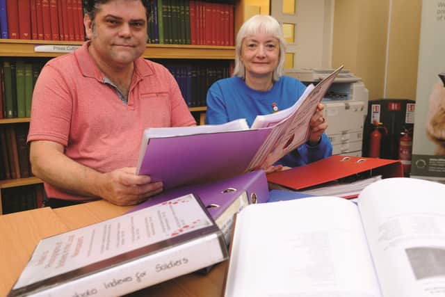 Andy Featherstone and Jayne Daley with some of their records