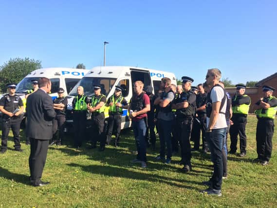 Officers being briefed at Schofield Park, Mexborough