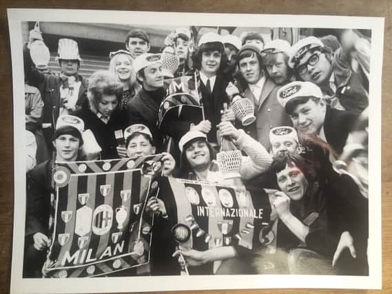 Millers fans with souvenirs from their trip to Milan for the European Cup decider between Celtic and Feyenoord.