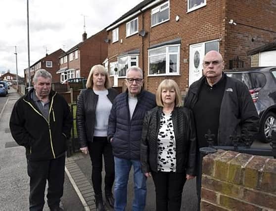 Angry residents from Katherine Road, Thurcroft, who have had their ground rents increased from £20 a year to over £2500 a year after their lease holds were sold to a private landlord. Pictured (from left to right) are, Terry Norman, Heather and Dennis Plant and Elaine and David Senior. 200382-2