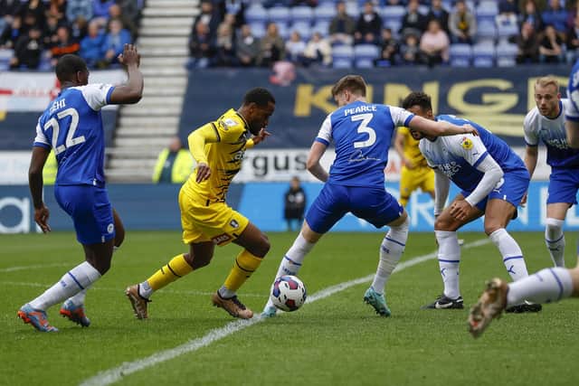 Tariqe Fosu in action at the DW Stadium. Picture by Jim Brailsford