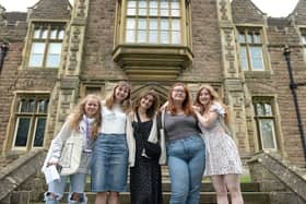 TRC students celebrate their A-level results. From left to right are: Katie Nixon, Liesel Bradbury, Sophie Mervill, Robyn Young and Poppy Rae Wilson.