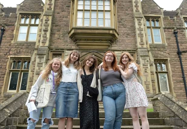 TRC students celebrate their A-level results. From left to right are: Katie Nixon, Liesel Bradbury, Sophie Mervill, Robyn Young and Poppy Rae Wilson.