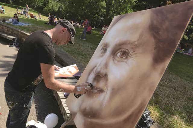 Artist Affix created a spray painted portrait of MP Jo Cox at the recent Great Get Together event in her memory at Clifton Park. 171028-11