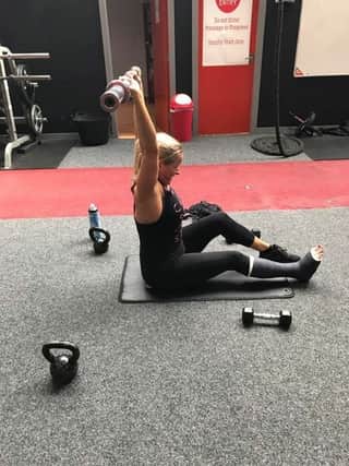 Angela Ord training despite her broken foot.