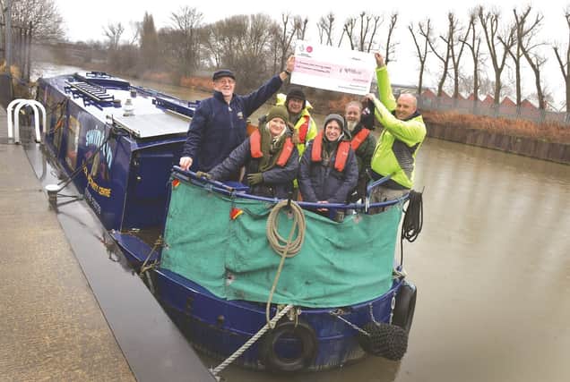 Swinton Lock Activity Centre is celebrating a grant for £9,993 from the Big Lottery Fund for the running costs for it's boats. Pictured from left to right are: trustee Stuart Ellis, trainee boat handler Bex Shaw, trustee Martin Telling, volunteer Lynne Jones, trainee boat handler Derek Frost and volunteer Richard Pritchard.180397