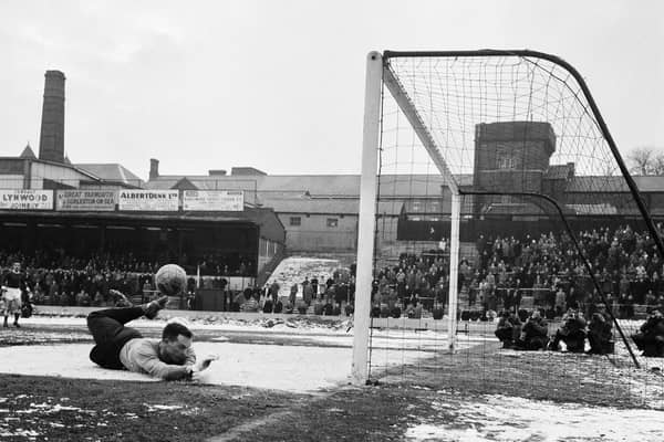 Roy Ironside makes a flying save in Rotherham United's long delayed FA Cup tie at Watford in 1963.