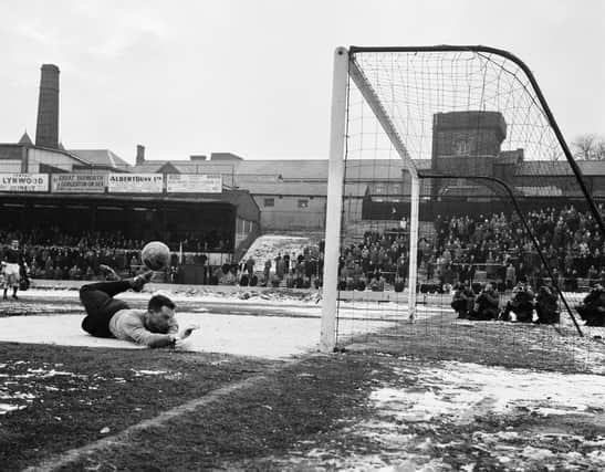 Roy Ironside makes a flying save in Rotherham United's long delayed FA Cup tie at Watford in 1963.