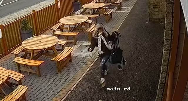 Kirsty Moxon caught on CCTV fleeing the scene.