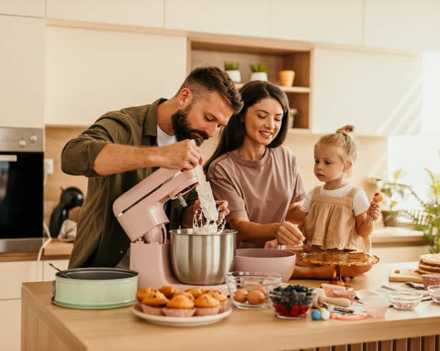 Stand mixers can take the effort out of baking, with options ranging from compact space-saving designs to colourful countertop statement pieces. Photo posed by models.