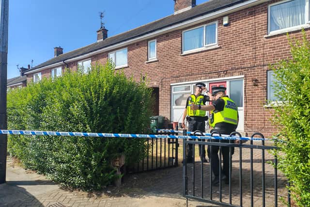 Police at a house in Rotherham after a man was arrested on suspicion of the murder of Ann Widdecombe