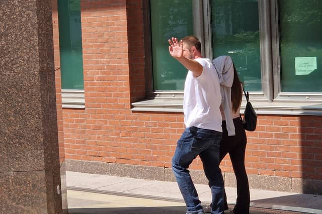 Laura Cunningham left court with an item of clothing over her head
