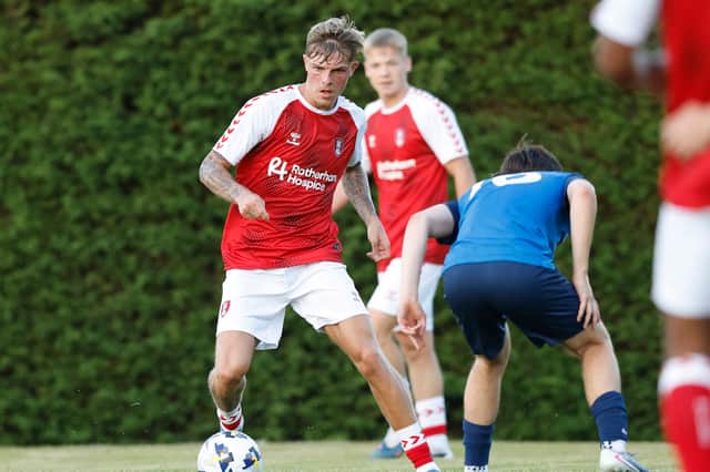 Brandon Williams plays for Rotherham United in a friendly against Parkgate.