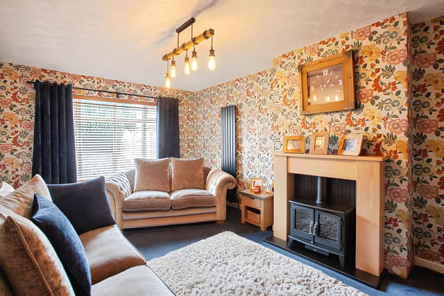 The bright and elegant lounge provides a welcoming space for relaxing in this carefully presented home