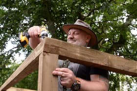Mick Smith working on a new shelter at the Swinton Sheds men's group, Swinton Lock.