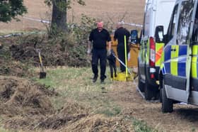 Officers dig out a pond in a field in Aston in the search for Teresa Shephard.