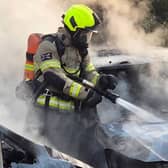 Emergency response: A firefighter at work in Bradgate Road (Image: SYFRS)