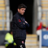 Alex Bruce reacts to Rotherham United's heavy home loss against Gillingham