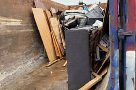 Recycling in action with a community skip in Rotherham