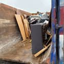 Recycling in action with a community skip in Rotherham