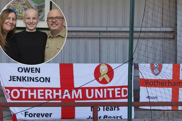 The Millers supporters club flag for Owen Jenkinson was unfurled during the Fleetwood match. He is pictured inset at his Whiston home with his parents Andrea and Bill
