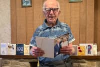 Dennis and his card from the King 