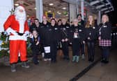 Rotherham Families First volunteers and Santa from the Lions Christmas sleigh, pictured at the Rotherham Toy Appeal launch at Parkgate Shopping last year.