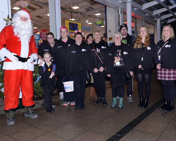 Rotherham Families First volunteers and Santa from the Lions Christmas sleigh, pictured at the Rotherham Toy Appeal launch at Parkgate Shopping last year.