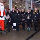 Rotherham Families First volunteers and Santa from the Lions Christmas sleigh, pictured at the Rotherham Toy Appeal launch at Parkgate Shopping last year.