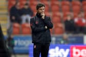 Alex Bruce watches proceedings between Rotherham United and Newport County